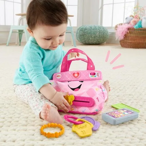 Fisher-Price Laugh & Learn My Smart Purse¬†- with Lights Music and Smart Stages Swtiches For Infant & Toddlers - Pink