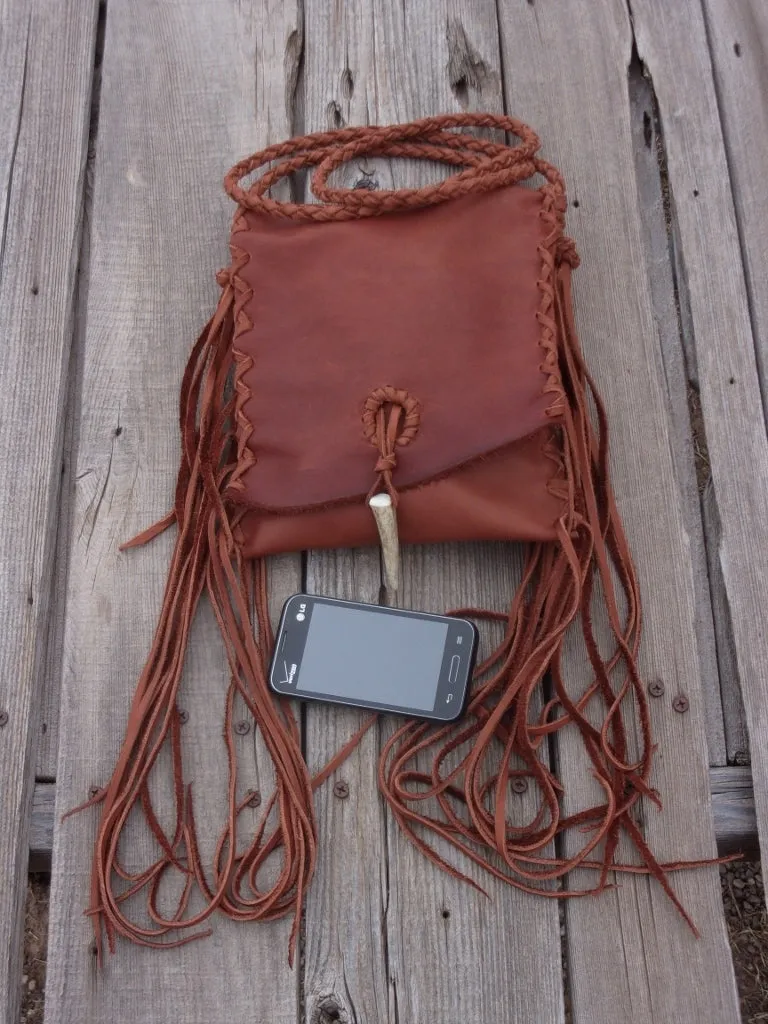 Fringed leather crossbody handbag , festival bag