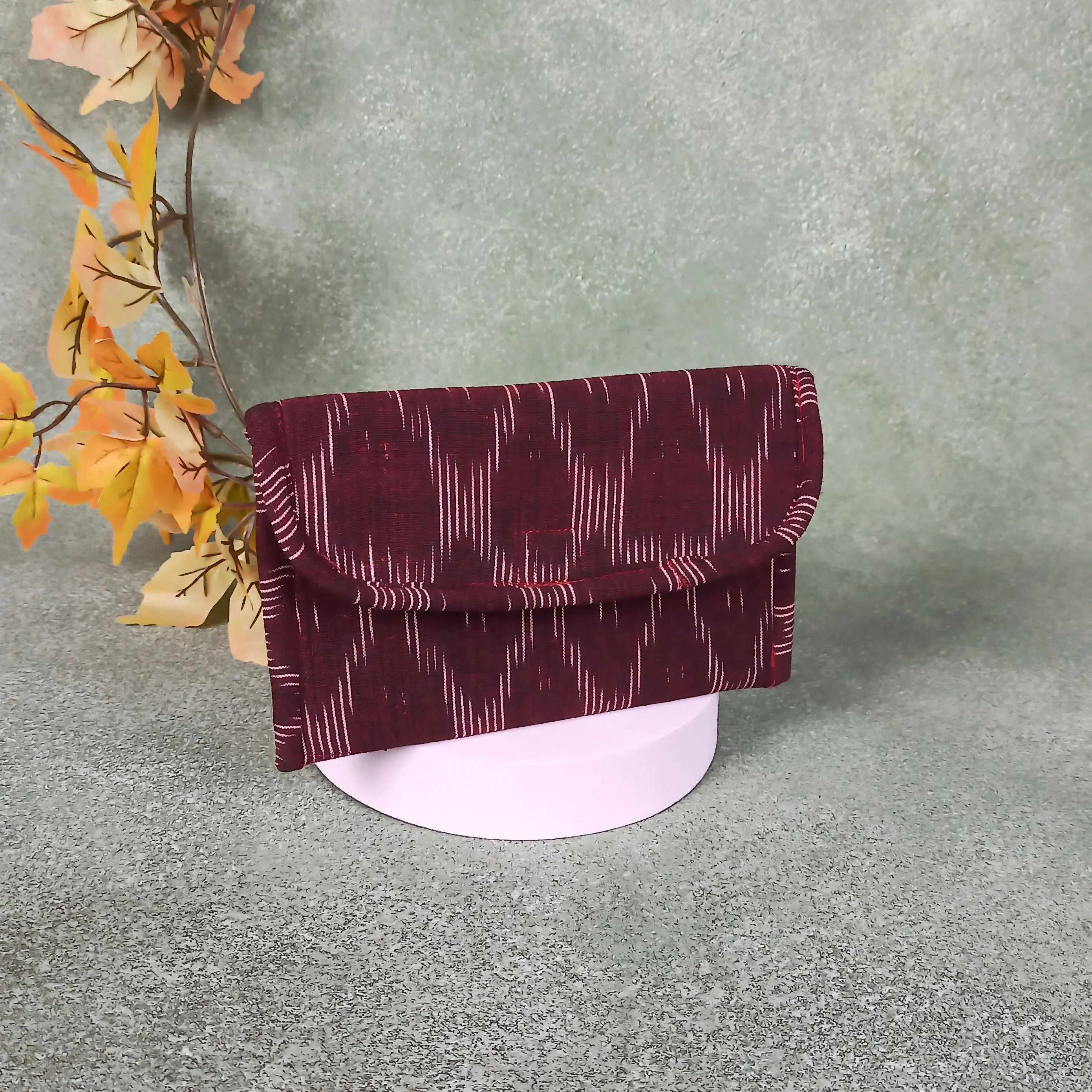 Ikat Clutch Maroon Colour with White Design.