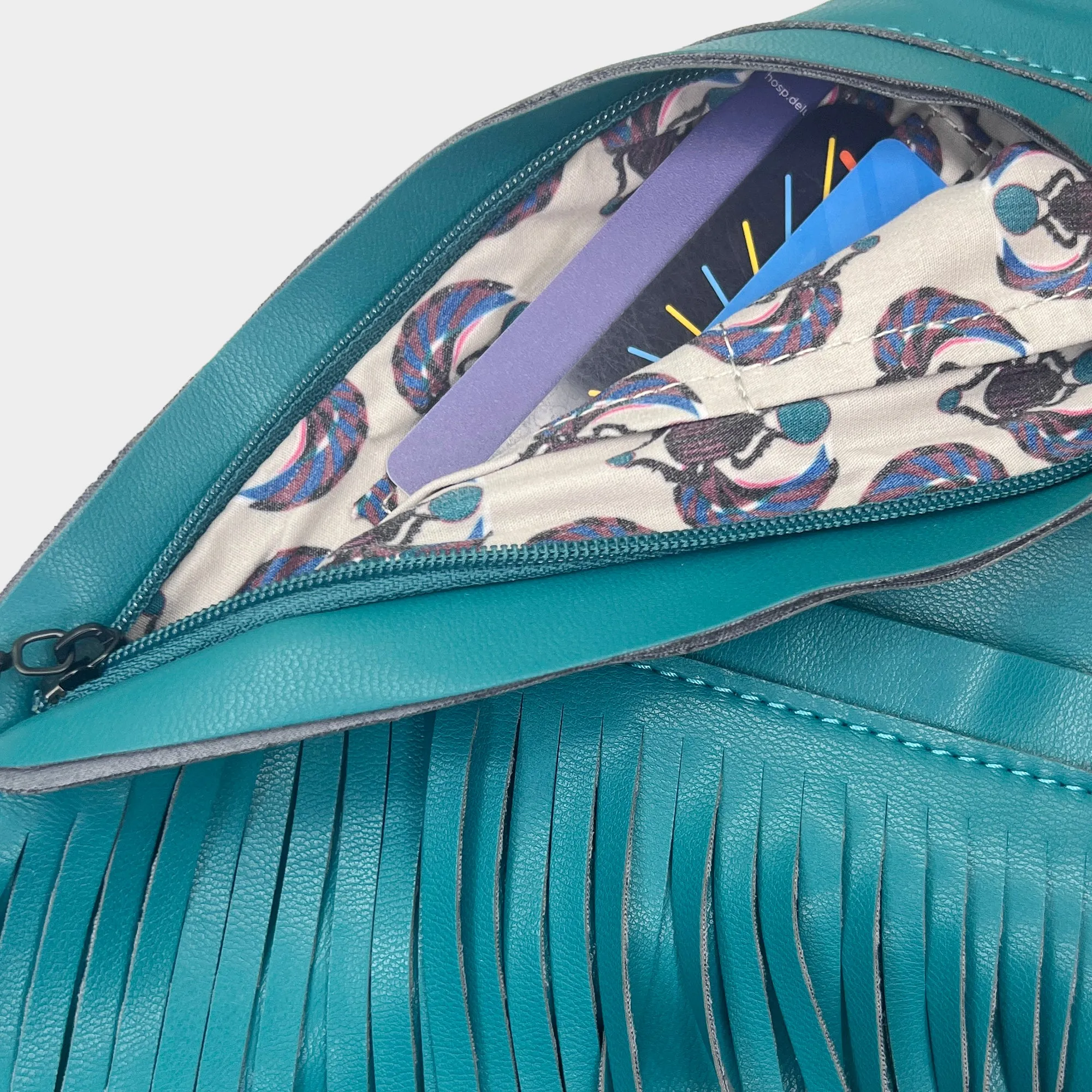 Turquoise Faux Leather Fringe Sash Bag